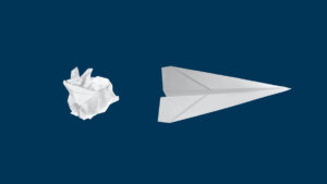 a crumpled ball of paper on the left is shown to be a paper airplane on the right